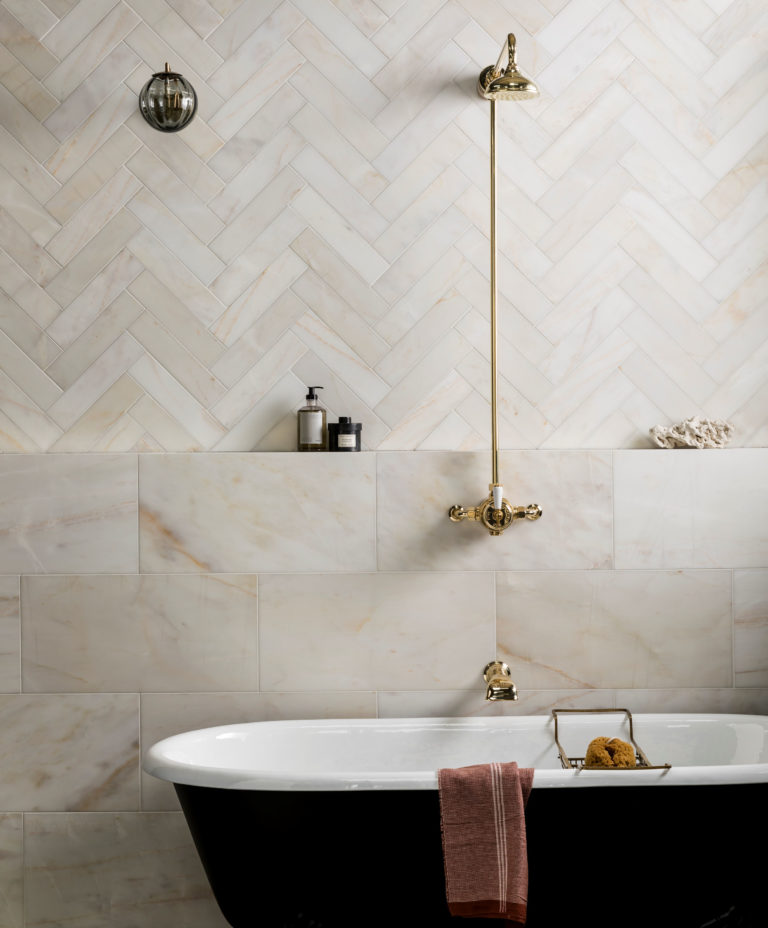 Calacatta Amber Honed Marble Wall & Floor Tiles. Calacatta Amber Honed Marble Bathroom tiles, laid herringbone on walls and floors.