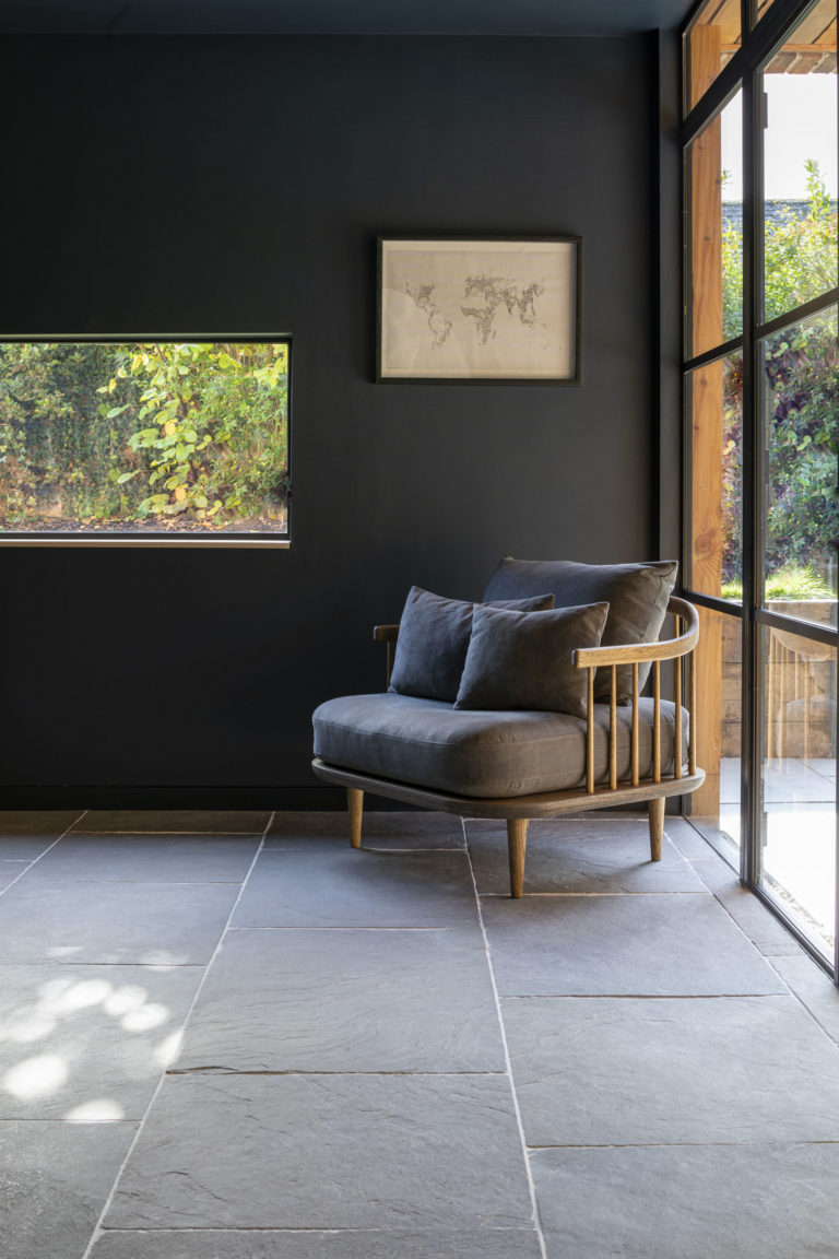 agincourt-grey-tumbled-limestone-tiles-dark-sofa