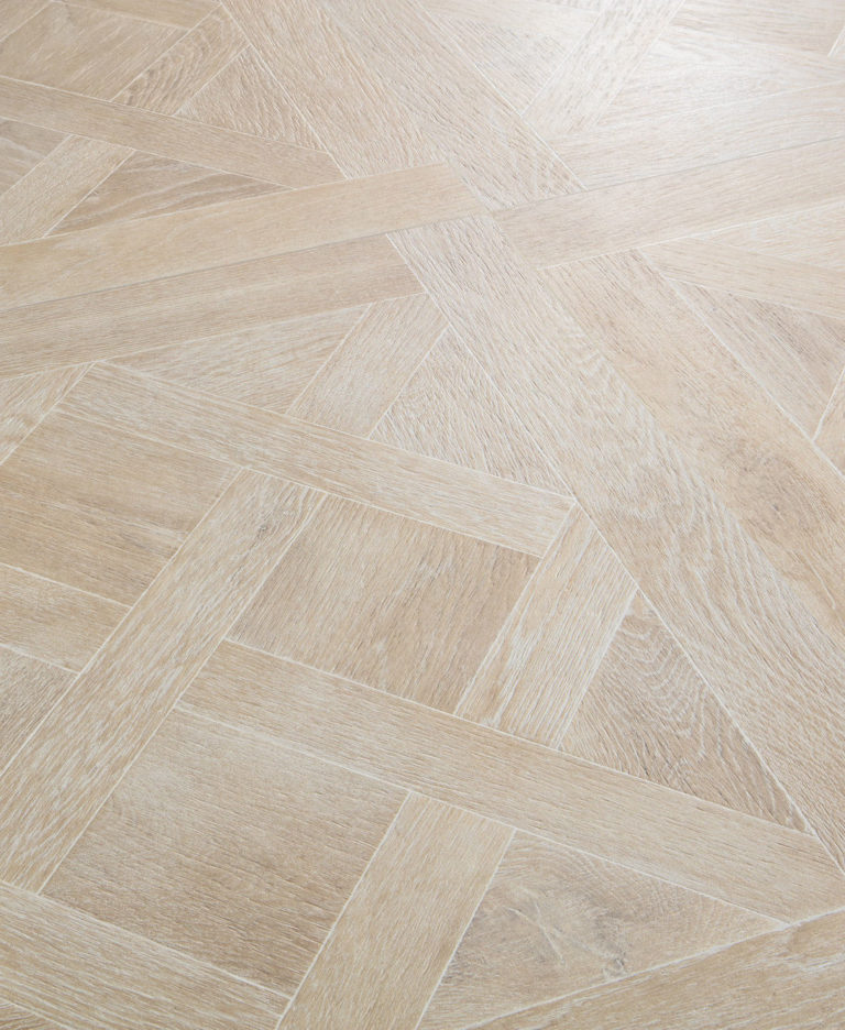Close up of Jakob Pine Parquet Porcelain wood effect tiled flooring